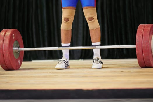 A weight lifter's feet before starting his lift