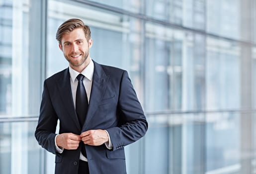 Portrait of a stylish corporate executive smiling confidently at the camera