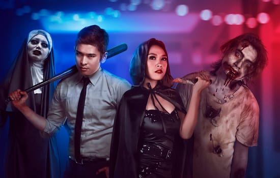People in halloween costumes show tense and scary faces