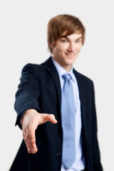 Young business man carrying a bunch of folders