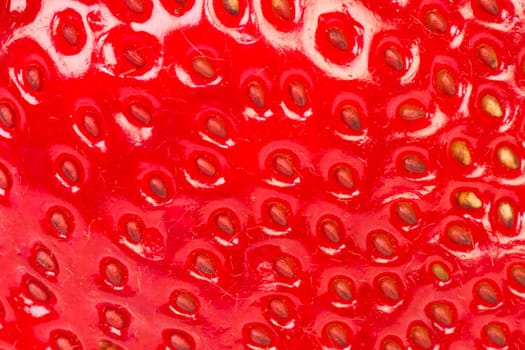 Extreme close-up about strawberry surface as texture background.