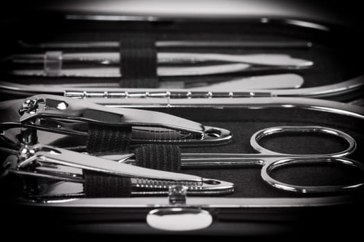 Macro photo about a nail set in own case for nail care.