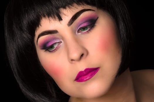 Portrait about woman with pink make-up.