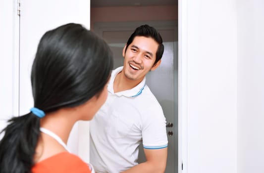 Young asian couple with smile having fun together at home