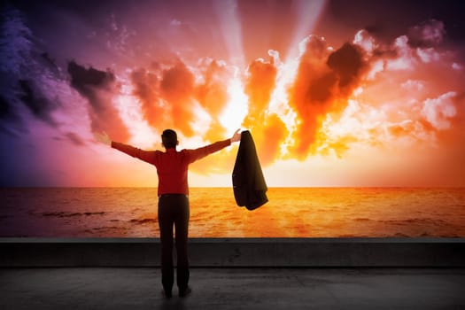 Asian business man looking the cloud on the sea. Business success concept