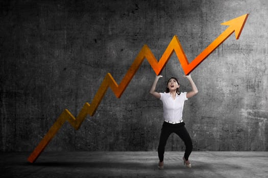 Asian business woman raise up sales chart so its ascending