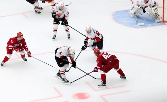 PODOLSK, RUSSIA - SEPTEMBER 3, 2017: M. Mineyev (51) and D. Semin (42) on hockey game Vityaz vs Avangard on 10th Russia KHL championship on September 3, 2017, in Podolsk, Russia. Vityaz won 6:2