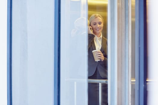 A young businesswoman talking on the phone