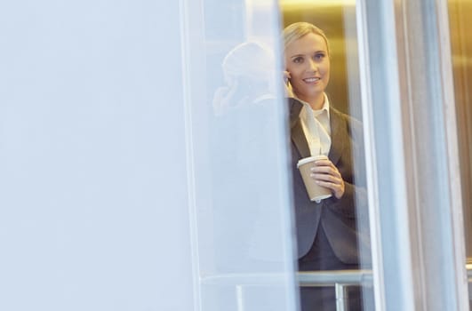 A young businesswoman talking on the phone
