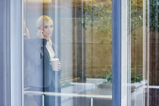 A young businesswoman talking on the phone