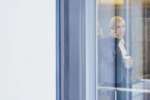 A young businesswoman talking on the phone