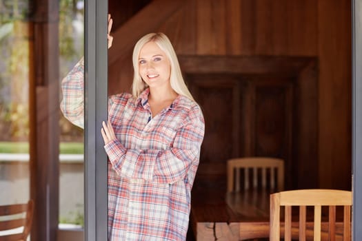 A beautiful young woman in her pyjamas at home