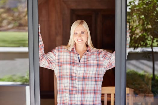 A beautiful young woman in her pyjamas at home