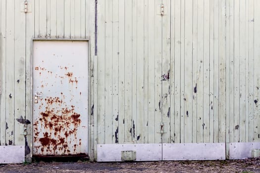 old shelter with rotten door. full frame image