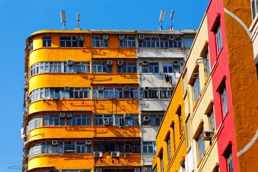 Old apartments in Hong Kong downtown at day