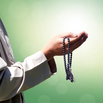 Hand of muslim people praying with abstract background