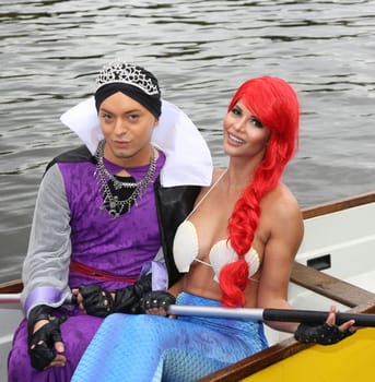 Julian F.M. Stoeckel ( evil stepmother of Snow White ) and Micaela Schaefer ( mermaid Arielle ) ,. Dragon boat race in favor of Hamburg children's aid projects at the Hansa Rowing Club on the Alster Hamburg ,09.09.2017.