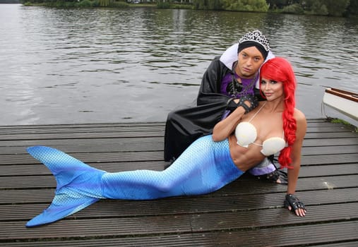Julian F.M. Stoeckel ( evil stepmother of Snow White ) and Micaela Schaefer ( mermaid Arielle ) ,. Dragon boat race in favor of Hamburg children's aid projects at the Hansa Rowing Club on the Alster Hamburg ,09.09.2017.