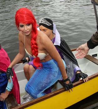 Julian F.M. Stoeckel ( evil stepmother of Snow White ) and Micaela Schaefer ( mermaid Arielle ) ,. Dragon boat race in favor of Hamburg children's aid projects at the Hansa Rowing Club on the Alster Hamburg ,09.09.2017.