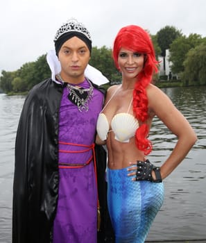 Julian F.M. Stoeckel ( evil stepmother of Snow White ) and Micaela Schaefer ( mermaid Arielle ) ,. Dragon boat race in favor of Hamburg children's aid projects at the Hansa Rowing Club on the Alster Hamburg ,09.09.2017.
