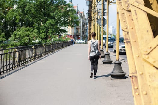 Poland urban landscape young girl on the bridge