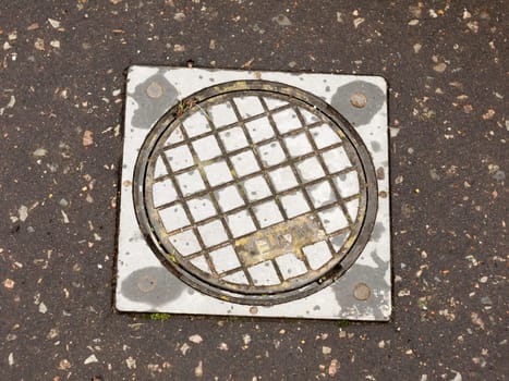close up pavement floor metal water grate texture background industry  England  UK