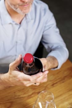 A glass of red wine. Handsome man drinking wine. Man drinking wine.