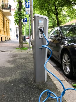 Electric car charging station in Oslo. Eco automobile that sparked a revolution