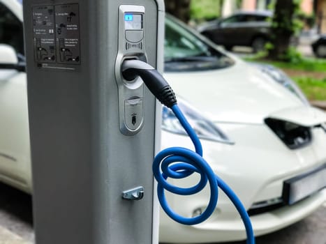Electric car charging station in Oslo. Eco automobile that sparked a revolution