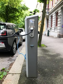 Oslo, Norway - 08 June 2017: Electric car charging station. Eco automobile that sparked a revolution