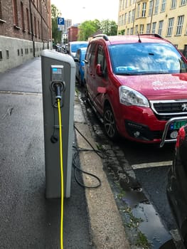 Oslo, Norway - 07 June 2017: Electric car charging station. Eco automobile that sparked a revolution