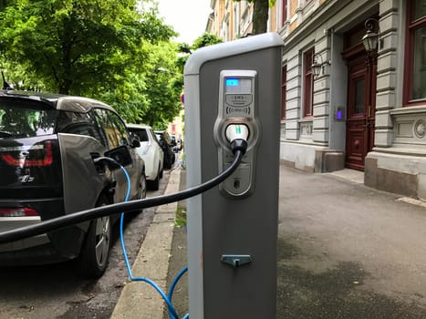 Oslo, Norway - 08 June 2017: Electric car charging station. Eco automobile that sparked a revolution