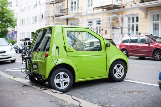 Electric car charging station in Oslo. Eco automobile that sparked a revolution
