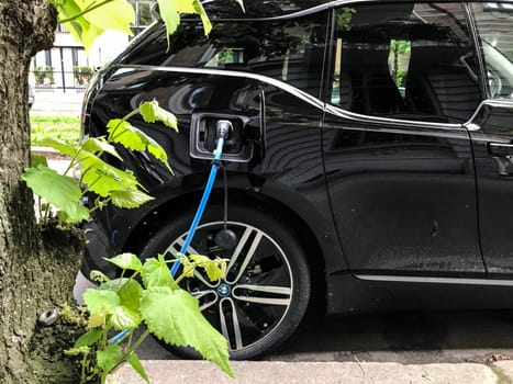 Oslo, Norway - 08 June 2017: Electric car charging station. Eco automobile that sparked a revolution