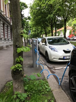 Oslo, Norway - 08 June 2017: Electric car charging station. Eco automobile that sparked a revolution