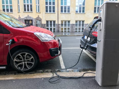 Electric car charging station in Oslo. Eco automobile that sparked a revolution