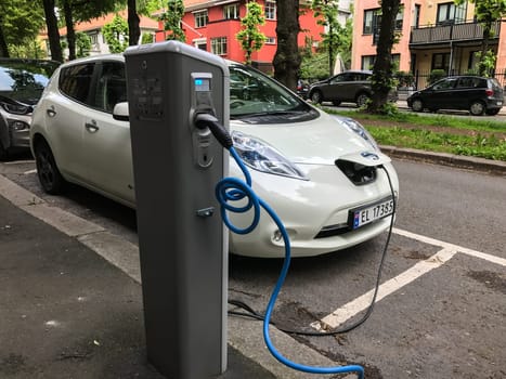 Oslo, Norway - 08 June 2017: Electric car charging station. Eco automobile that sparked a revolution