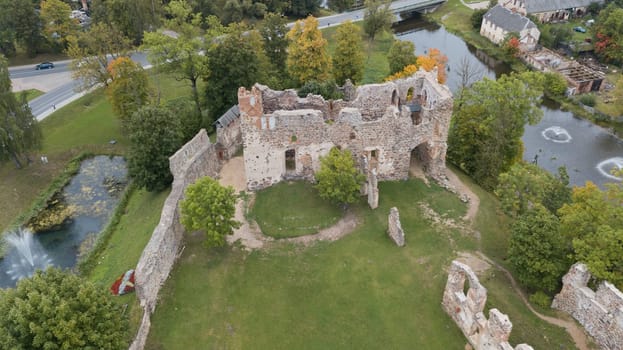 ruins of an ancient medieval castle Dobele Latvia Aerial drone top view