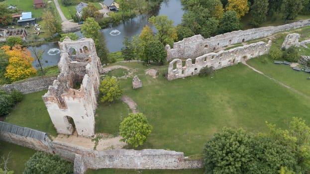 ruins of an ancient medieval castle Dobele Latvia Aerial drone top view