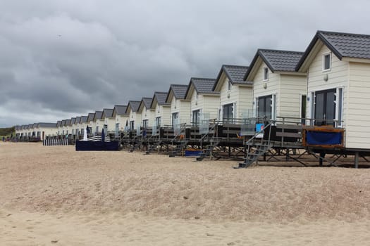 Netherlands 15 August 2015: Beach houses on the North Sea beach .