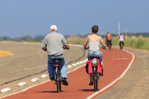 Netherlands 22 August 2015: Some cyclists on a trip into nature
