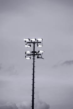Luminous stadium floodlights or mock throws to illuminate a football stadium.