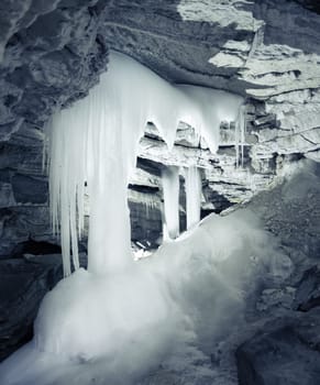 View of the ice cave with icicles. Kungur. Russia