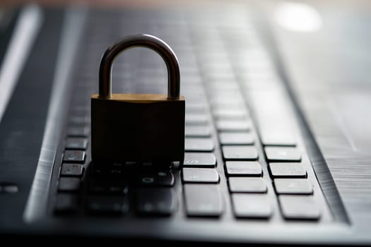 Computer keyboard and padlock as a symbol of security on the Internet
