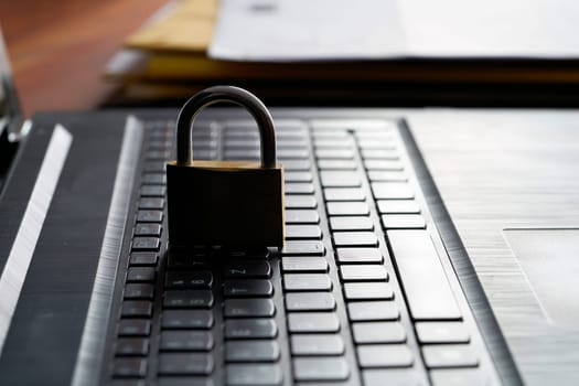 Computer keyboard and padlock as a symbol of security on the Internet