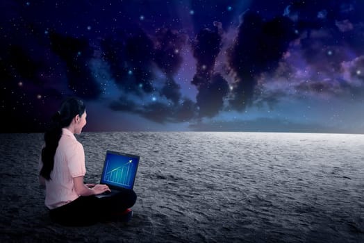 Business woman working on outer space. Out of office working concept