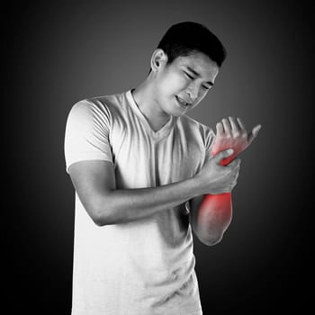 Asian man have hand pain. This is health  concept