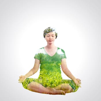 Asian pregnant woman doing yoga with double exposure concept.