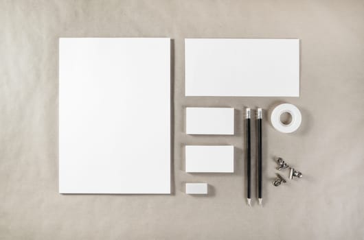 Photo of blank stationery. Corporate identity template on paper background. Mock up for design portfolios. Top view.