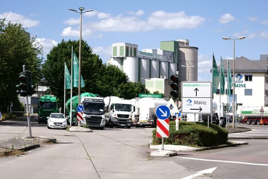 Mainz,Germany - June 10,2017: Trucks park in front of the entrance to the premises of Heidelberg Zement on June 10,2017 in Mainz.